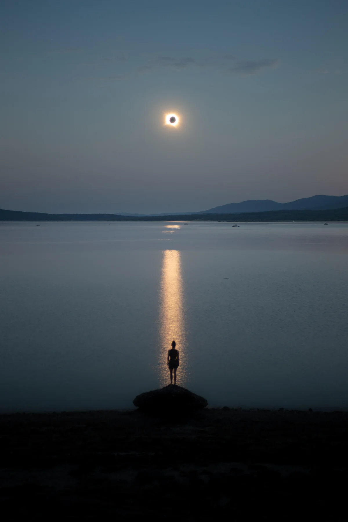 Stunning Solar Eclipse Reflected in Water Captured by Rémi Leblanc-Messager