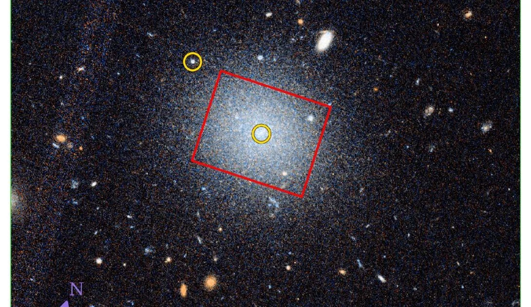 Discovery of a Third Galaxy Lacking Dark Matter in the NGC 1052 Field
